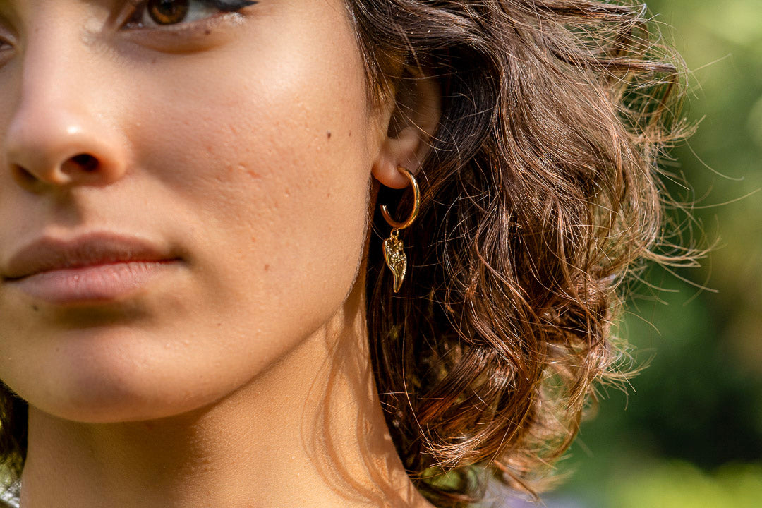 Damaged heart earrings